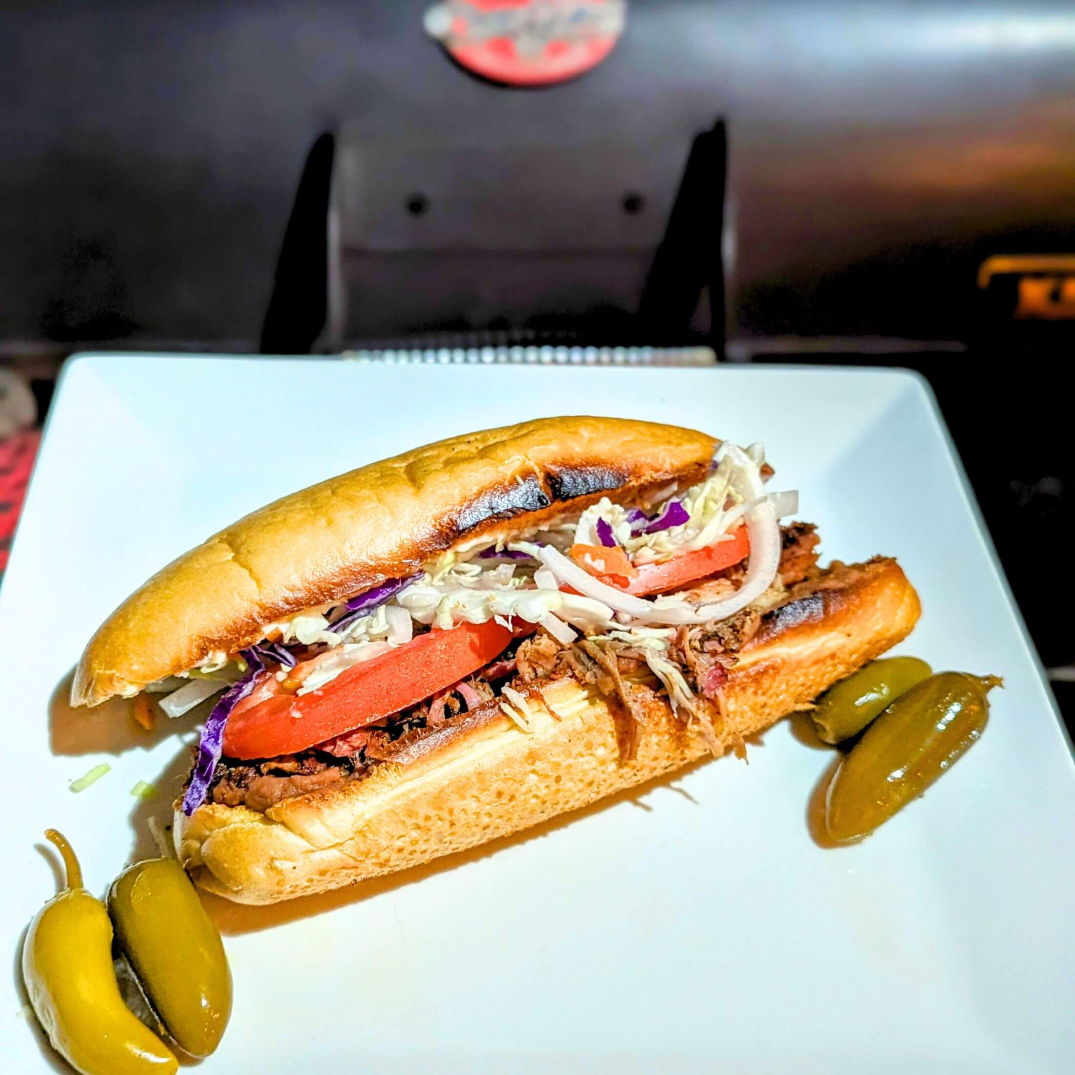 Carnitas Tortas served with pickled jalapenos