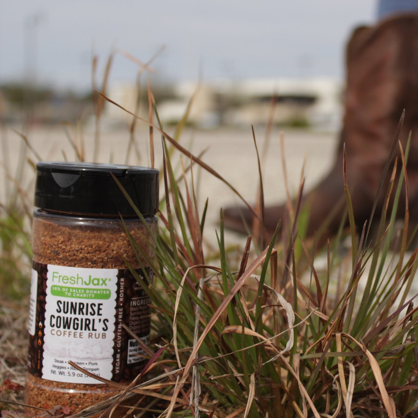 Sunrise Cowgirl Coffee rub on a sand dune