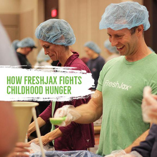 FreshJax Organic Spices teammates packing meals to donate to children