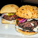 Lamb Burger Seasoned with Greek Seasoning and topped with Feta Cheese