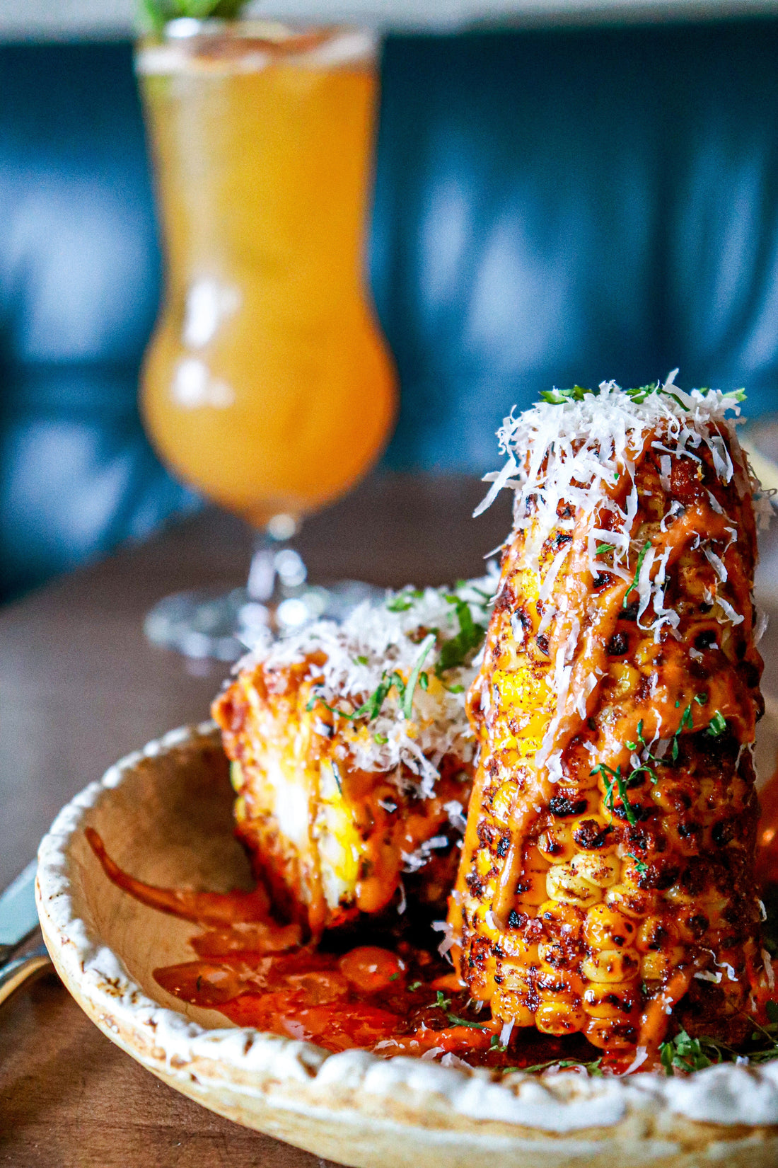 Maxican street corn, elote, or esquites with a Margarita