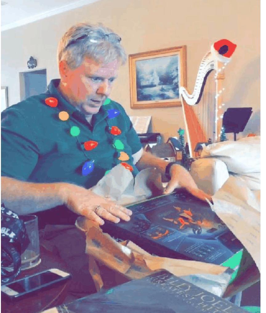 Dad Opening A Gift