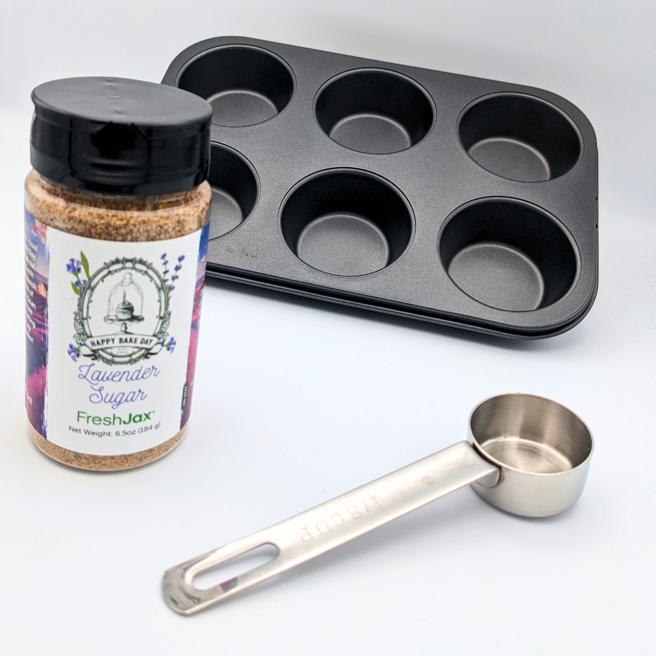 FreshJax Organic Spices | Happy Bake Day Show Lavender Sugar next to measuring cup and muffin pan